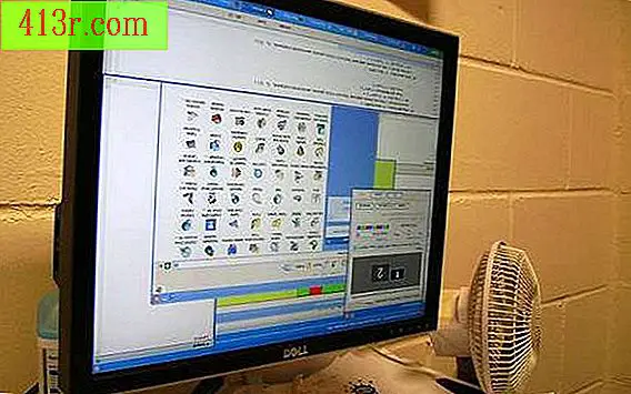 Как да завъртите екрана в Windows XP