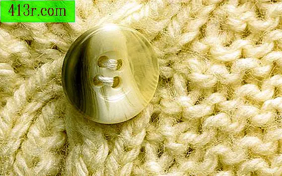 Как да се определи разкъсана плета в плетени пуловер с дизайн