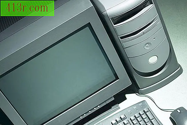 Komputer desktop termasuk enklosur perangkat keras dan monitor eksternal.
